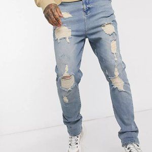 ASOS DESIGN drop crotch jeans in vintage light wash blue with heavy rips Size 32